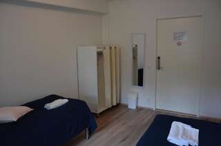 Хостелы Hostel Tikka Рованиеми Двухместный номер с 2 отдельными кроватями и общей ванной комнатой-4
